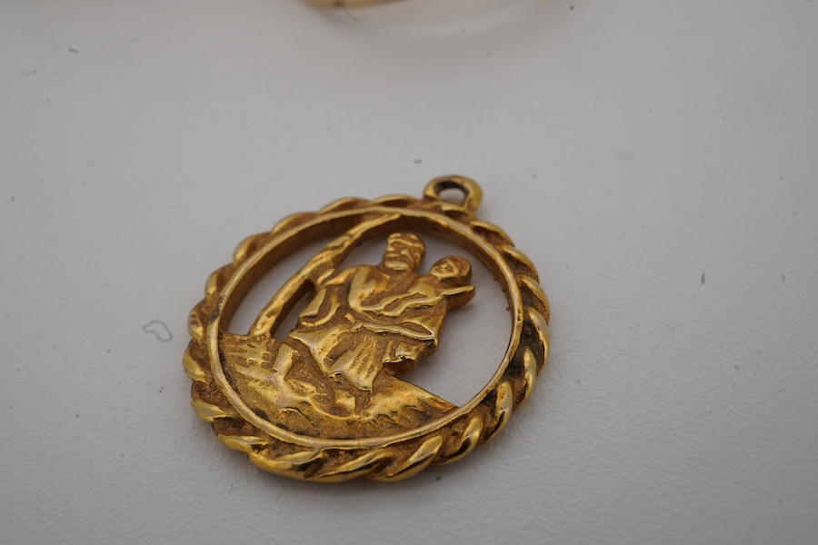 A 9ct gold and diamond set signet ring, size M/N, a fluted 9ct gold ring and a 9ct gold St. Christopher's charm, gross weight 13.2 grams.